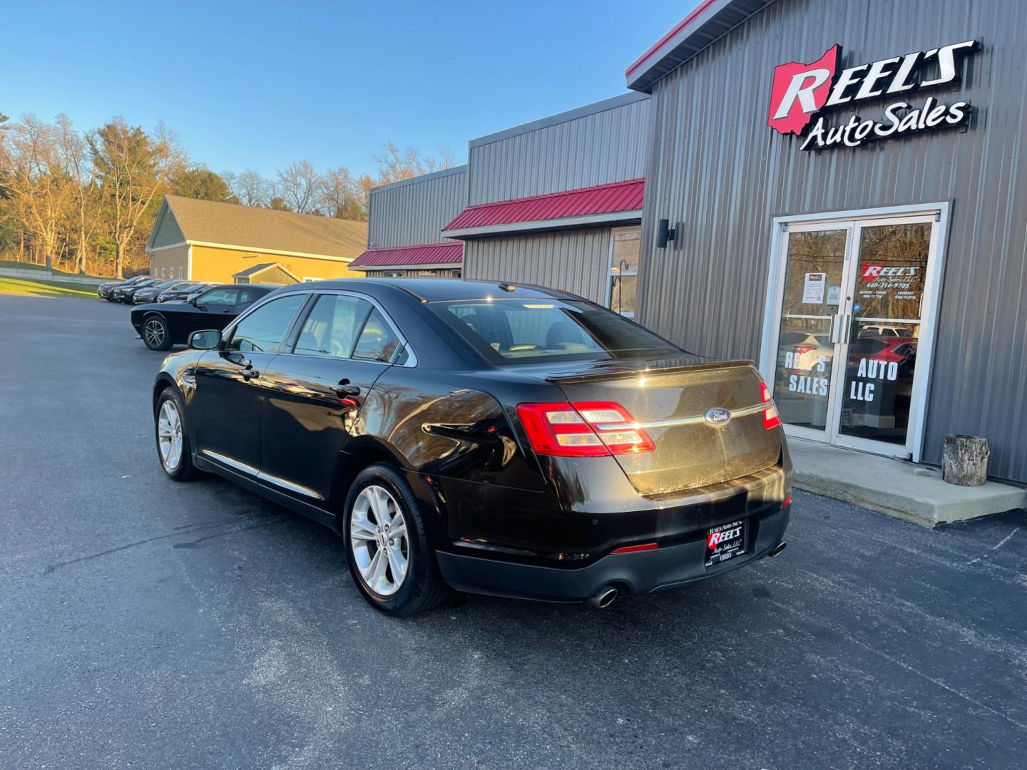 2013 Black /Black Ford Taurus SEL FWD (1FAHP2E85DG) with an 3.5L V6 DOHC 24V engine, 6-Speed Automatic transmission, located at 547 E. Main St., Orwell, OH, 44076, (440) 437-5893, 41.535435, -80.847855 - Photo#10